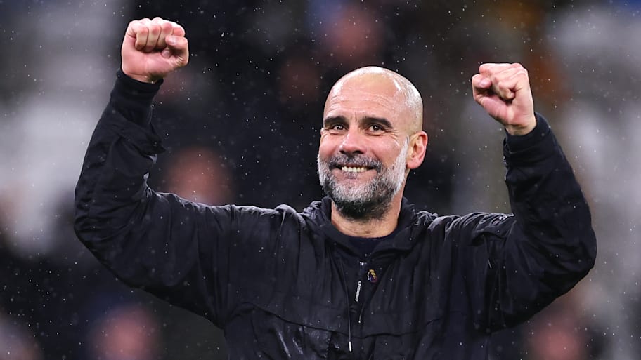 Pep Guardiola’celebrates with Manchester City’s fans after beating Newcastle