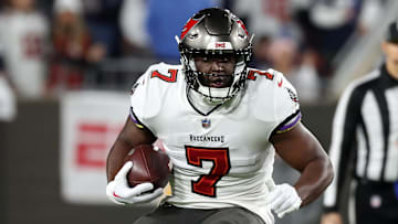 Jan 16, 2023; Tampa, Florida, USA; Tampa Bay Buccaneers running back Leonard Fournette (7) rushes