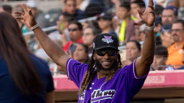 aaron jones at a charity softball game