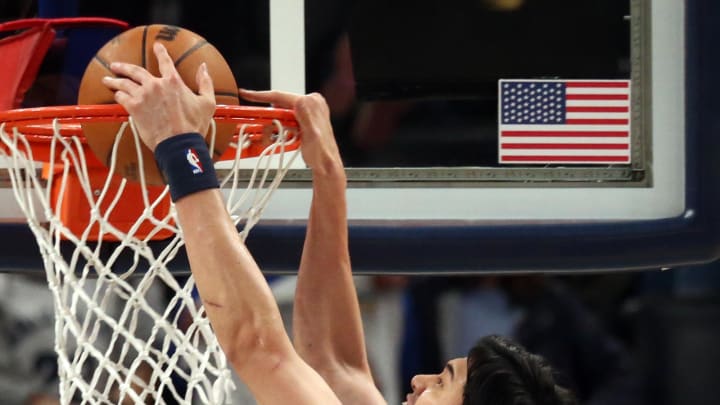 Feb 12, 2024; Memphis, Tennessee, USA; Memphis Grizzlies forward Yuta Watanabe (18) dunks during the second half against the New Orleans Pelicans at FedExForum. Mandatory Credit: Petre Thomas-USA TODAY Sports