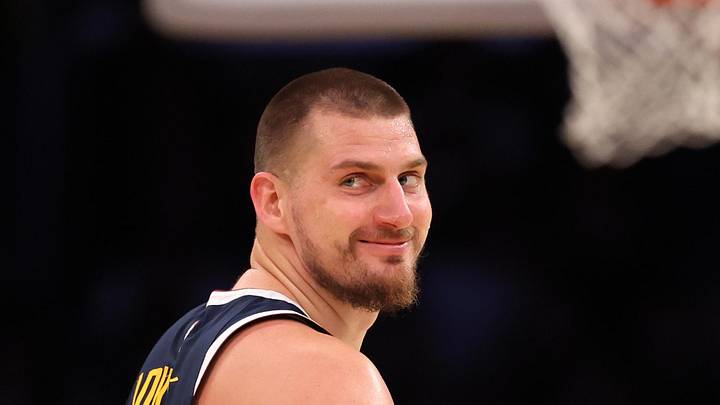 Nov 23, 2024; Los Angeles, California, USA;  Denver Nuggets center Nikola Jokic (15) smiles during the first half against the Los Angeles Lakers at Crypto.com Arena. Mandatory Credit: Kiyoshi Mio-Imagn Images