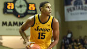 Dec 18, 2021; Sioux Falls, South Dakota, USA;  Iowa Hawkeyes forward Keegan Murray (15) looks to shoot against the Utah State Aggies in the first half at Sanford Pentagon. Mandatory Credit: Steven Branscombe-Imagn Images