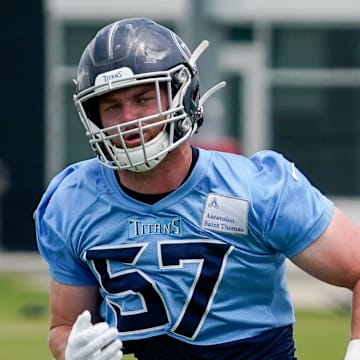 Tennessee Titans linebacker Luke Gifford (57) runs drills during an OTA practice at Ascension Saint Thomas Sports Park in Nashville, Tenn., Tuesday, May 23, 2023.