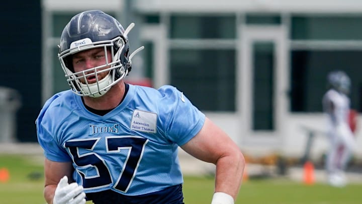 Tennessee Titans linebacker Luke Gifford (57) runs drills during an OTA practice at Ascension Saint Thomas Sports Park in Nashville, Tenn., Tuesday, May 23, 2023.