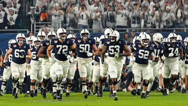 Penn State football team coming out onto the field