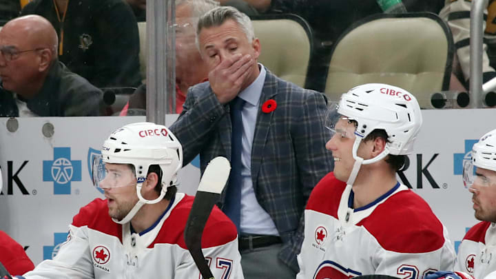 Nov 2, 2024; Pittsburgh, Pennsylvania, USA; Montreal Canadiens head coach Martin St. Louis (rear) reacts on the bench against the Pittsburgh Penguins during the third period at PPG Paints Arena. Mandatory Credit: Charles LeClaire-Imagn Images Nov 2, 2024; Pittsburgh, Pennsylvania, USA; Montreal Canadiens head coach Martin St. Louis (rear) reacts on the bench against the Pittsburgh Penguins during the third period at PPG Paints Arena. Mandatory Credit: Charles LeClaire-Imagn Images