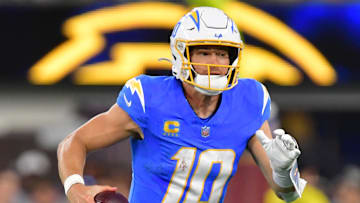 Wearing a padded glove on his broken left hand, Justin Herbert endured seven sacks while leading the Chargers to a 22-19 win on Monday Night Football.