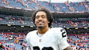Sep 10, 2023; Denver, Colorado, USA; Las Vegas Raiders safety Isaiah Pola-Mao (20) reacts following the win over the Denver Broncos at Empower Field at Mile High. Mandatory Credit: Ron Chenoy-Imagn Images