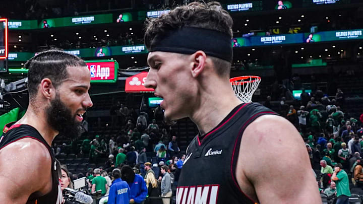 Apr 24, 2024; Boston, Massachusetts, USA; Miami Heat guard Tyler Herro (14) and forward Caleb Martin (16) react after defeating the Boston Celtics in game two of the first round for the 2024 NBA playoffs at TD Garden. Mandatory Credit: David Butler II-Imagn Images