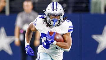 Aug 22, 2025; Arlington, Texas, USA; Dallas Cowboys running back Jaydon Blue (34) carries the ball during the fourth quarter against the Atlanta Falcons at AT&T Stadium. Mandatory Credit: Andrew Dieb-Imagn Images