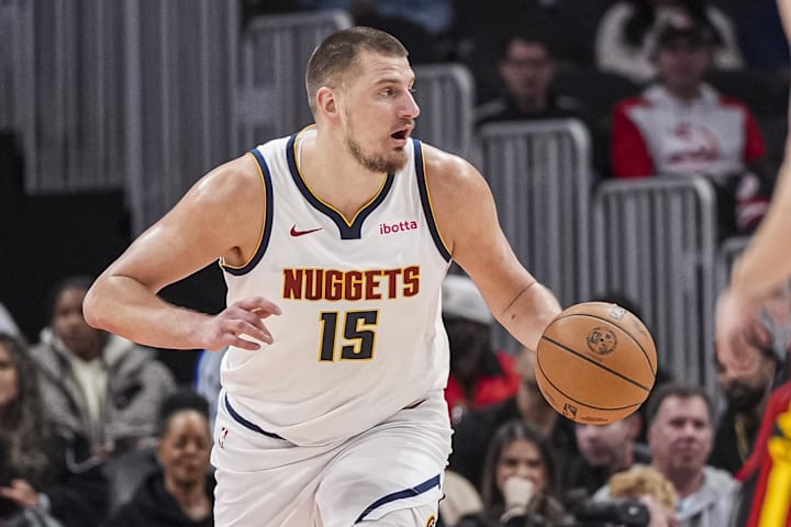 Denver Nuggets center Nikola Jokic controls the ball against the Atlanta Hawks on Dec. 8, 2024.