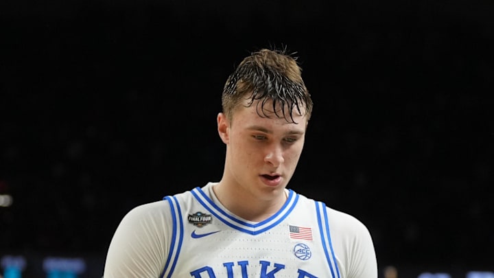 Apr 5, 2025; San Antonio, TX, USA; Duke Blue Devils forward Cooper Flagg (2) walks off the court after losing to the Houston Cougars in the semifinals of the men's Final Four of the 2025 NCAA Tournament at the Alamodome. Mandatory Credit: Robert Deutsch-Imagn Images Apr 5, 2025; San Antonio, TX, USA; Duke Blue Devils forward Cooper Flagg (2) walks off the court after losing to the Houston Cougars in the semifinals of the men's Final Four of the 2025 NCAA Tournament at the Alamodome. Mandatory Credit: Robert Deutsch-Imagn Images
