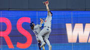 Dodgers center fielder Andy Pages makes a game-saving catch in the ninth inning while colliding with teammate Kiké Hernandez.
