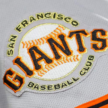 Jul 18, 2023; Cincinnati, Ohio, USA; The San Francisco Giants logo on the sleeve of right fielder Michael Conforto (8) during the fifth inning against the Cincinnati Reds at Great American Ball Park. 