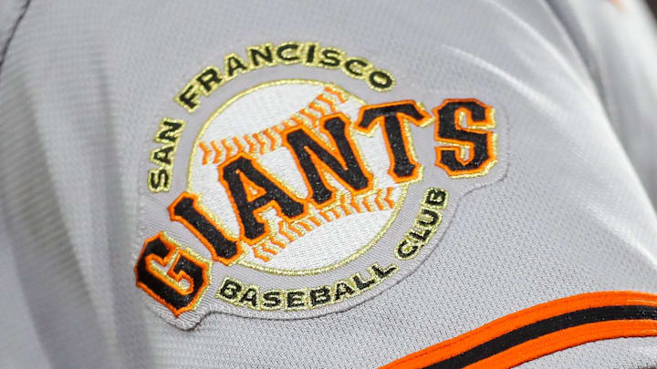Jul 18, 2023; Cincinnati, Ohio, USA; The San Francisco Giants logo on the sleeve of right fielder Michael Conforto (8) during the fifth inning against the Cincinnati Reds at Great American Ball Park. Jul 18, 2023; Cincinnati, Ohio, USA; The San Francisco Giants logo on the sleeve of right fielder Michael Conforto (8) during the fifth inning against the Cincinnati Reds at Great American Ball Park.