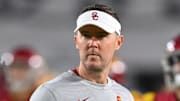 Oct 1, 2022; Los Angeles, California, USA;  USC Trojans head coach Lincoln Riley walks on the field before a game against the Arizona State Sun Devils at United Airlines Field at the Los Angeles Memorial Coliseum. Mandatory Credit: Jayne Kamin-Oncea-Imagn Images