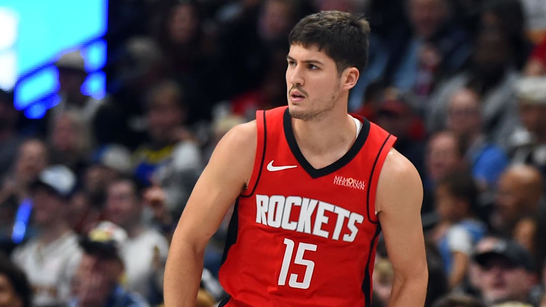 Dec 20, 2025; Denver, Colorado, USA; Houston Rockets guard Reed Sheppard (15) celebrates after making a basket during the second half against the Denver Nuggets at Ball Arena. Mandatory Credit: Christopher Hanewinckel-Imagn Images