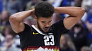 Nov 17, 2025; Denver, Colorado, USA; Denver Nuggets forward Cam Johnson (23) reacts in the fourth quarter against the Chicago Bulls at Ball Arena.