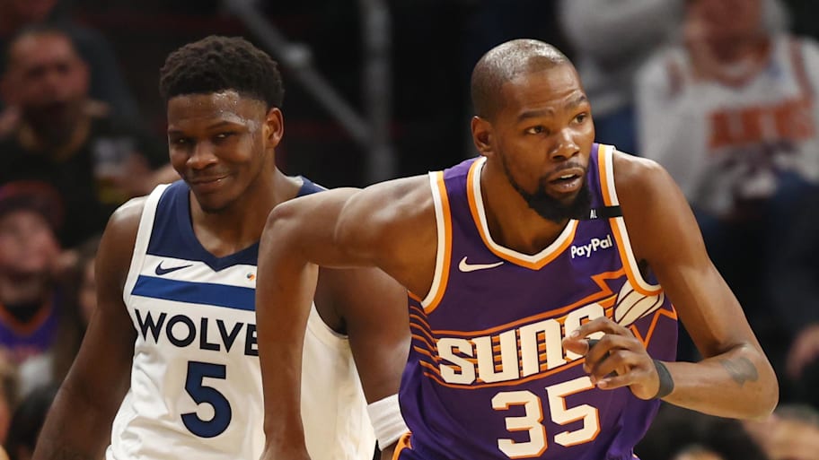 Phoenix Suns forward Durant against Minnesota Timberwolves guard Edwards at Footprint Center.  | Mark J. Rebilas-Imagn Images