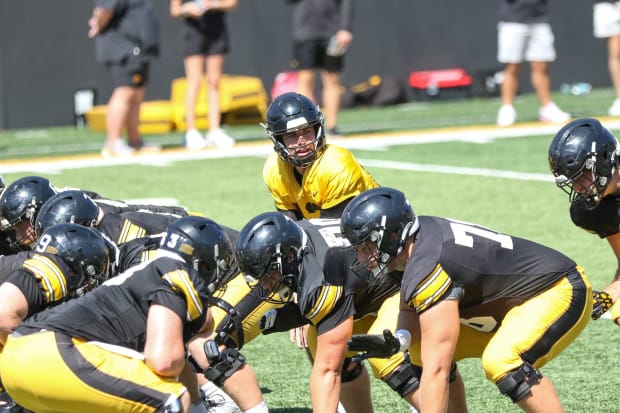 Iowa' QB Cade McNamara calls out the play at practice on Aug. 10, 2024 in Iowa City. (Rob Howe/HN) 