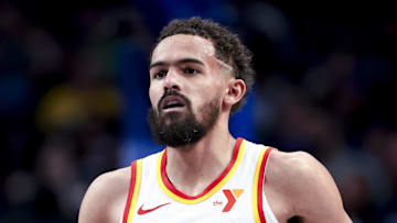 Trae Young #11 of the Atlanta Hawks dribbles the ball against the Dallas Mavericks.