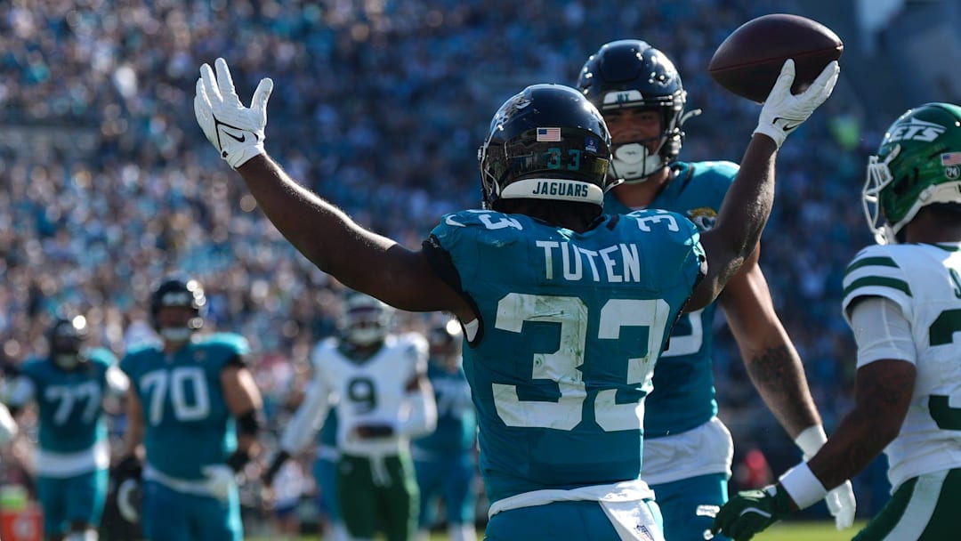 Jacksonville Jaguars running back Bhayshul Tuten (33) celebrates his touchdown in second quarter during an NFL football game at EverBank Stadium, Sunday, Dec. 14, 2025, in Jacksonville, Fla. [Doug Engle/Florida Times-Union]