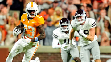 Tennessee's Boo Carter runs with the ball against Mississippi State during a 2024 game at Neyland Stadium.
