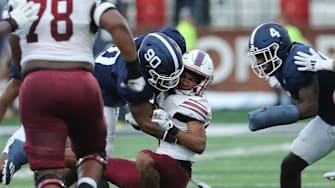 South Carolina State's Caden High is hit by Georgia Southern's Da'Shawn Davis on Saturday, September 14, 2024 at Allen E. Paulson Stadium.