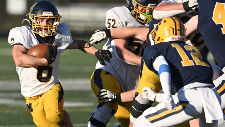 Cody Haddad of St. Ignatius eyes the runner while preparing to make a tackle against Archbishop Moeller in a game on October 8, 2022.