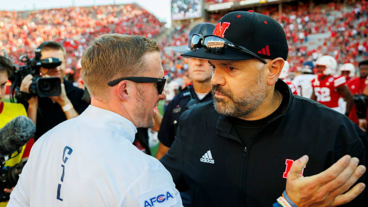 UTEP head coach Scotty Walden, left, shakes hands with Nebraska head coach Matt Rhule after the Cornhuskers defeated the Miners 40-7 at Memorial Stadium in Lincoln, Nebraska, Saturday, August 31, 2024.