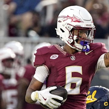 Former Florida State Seminoles wide receiver Jalen Brown (6) signals first down after a catch during the first half against the California Golden Bears at Doak S. Campbell Stadium. 