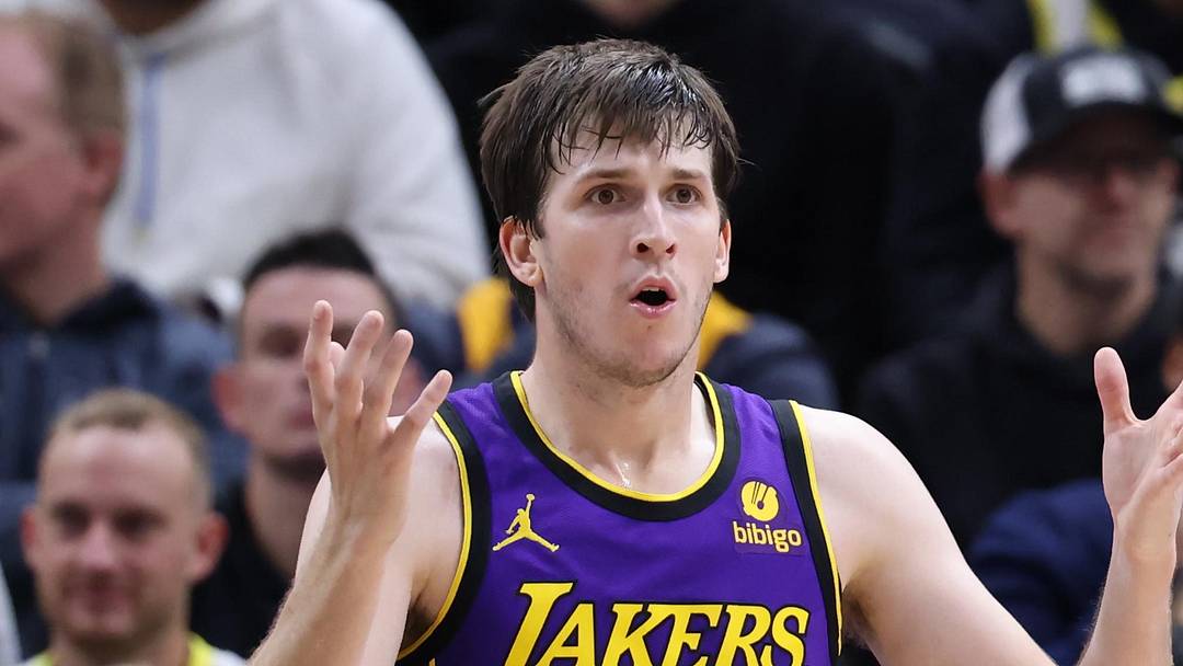 Jan 13, 2024; Salt Lake City, Utah, USA; Los Angeles Lakers guard Austin Reaves (15) reacts to being called for a foul against the Utah Jazz during the second quarter at Delta Center. Mandatory Credit: Rob Gray-Imagn Images
