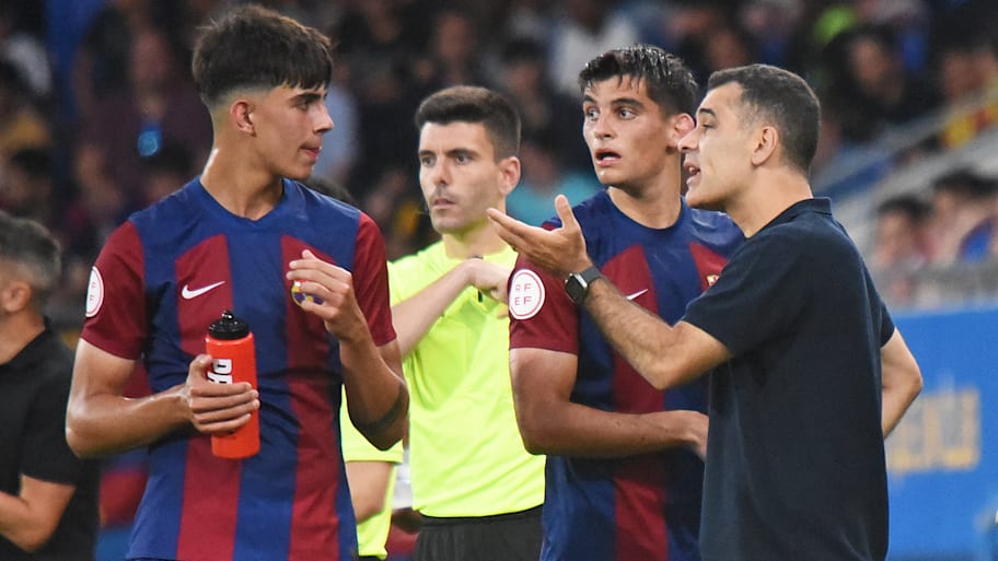 Márquez (right) spent two years as Barça Atlètic manager.