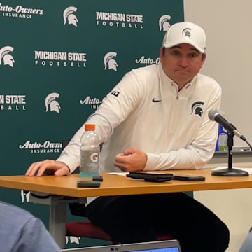 Michigan State head coach Jonathan Smith talks after a 38-13 loss to the Indiana Hoosiers in Bloomington, Ind.