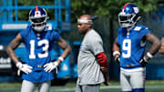 Steve Smith, a former Pro Bowl NFL wide receiver, was a guest coach at the Giants' OTAs last spring. There, he worked with receivers  Jalin Hyatt (left) and Malik Nabers.  
