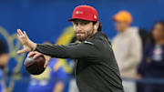 Nov 23, 2025; Inglewood, California, USA; Tampa Bay Buccaneers quarterback Baker Mayfield (6) warms up before the game against the Los Angeles Rams at SoFi Stadium. Mandatory Credit: Kiyoshi Mio-Imagn Images