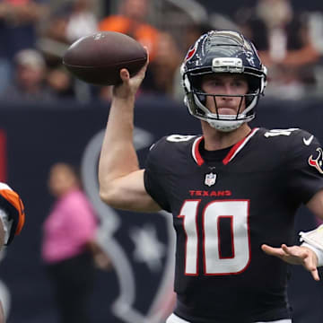 Nov 2, 2025; Houston, Texas, USA; Houston Texans quarterback Davis Mills (10) throws during the first half against the Denver Broncos at NRG Stadium. Mandatory Credit: Thomas Shea-Imagn Images