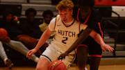 St. Cloud Tech boys basketball junior Manabenda James reaches for the ball during a game Dec. 28, 2024 against Hutchinson at Tech High School. The Tigers lost 50-47.