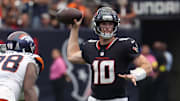 Nov 2, 2025; Houston, Texas, USA; Houston Texans quarterback Davis Mills (10) throws during the first half against the Denver Broncos at NRG Stadium. Mandatory Credit: Thomas Shea-Imagn Images