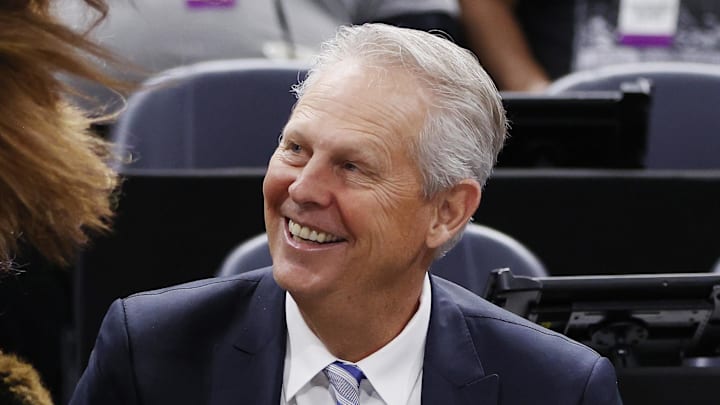 Dec 15, 2021; Salt Lake City, Utah, USA;  Danny Ainge is greeted by Jazz Bear as he watches pregame activities after being appointed Alternate Governor and CEO of Utah Jazz Basketball prior to their game against the LA Clippers at Vivint Arena. Mandatory Credit: Jeffrey Swinger-Imagn Images