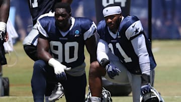 Jul 30, 2024; Oxnard, CA, USA; Dallas Cowboys defensive end DeMarcus Lawrence (90) and linebacker Micah Parsons (11) during training camp at the River Ridge Playing Fields in Oxnard, California. Mandatory Credit: Jason Parkhurst-Imagn Images