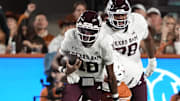 Texas A&M Aggies quarterback Marcel Reed keeps the ball for yards during the first half against the Texas Longhorns at Darrell K Royal-Texas Memorial Stadium.