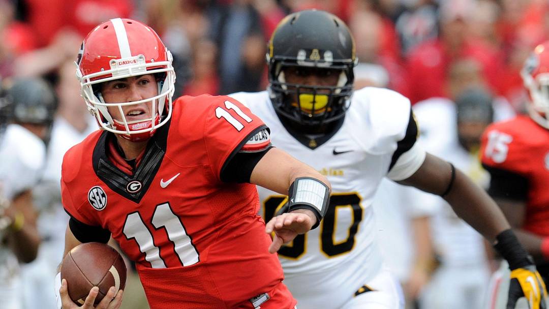 Nov 9, 2013; Athens, GA, USA; Georgia Bulldogs quarterback Aaron Murray (11) runs through the Appalachian State Mountaineers defense during the second half at Sanford Stadium. Georgia defeated Appalachian State 45-6. Mandatory Credit: Dale Zanine-Imagn Images Nov 9, 2013; Athens, GA, USA; Georgia Bulldogs quarterback Aaron Murray (11) runs through the Appalachian State Mountaineers defense during the second half at Sanford Stadium. Georgia defeated Appalachian State 45-6. Mandatory Credit: Dale Zanine-Imagn Images