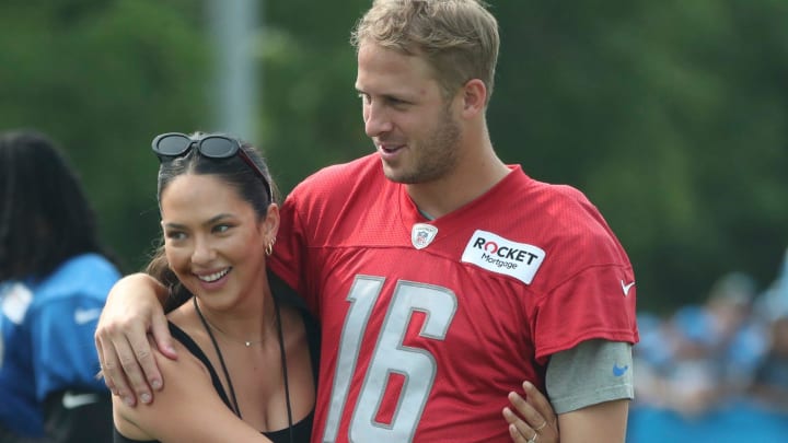 Lions quarterback Jared Goff and his now wife, Christen Harper, on the field at the end of training camp.