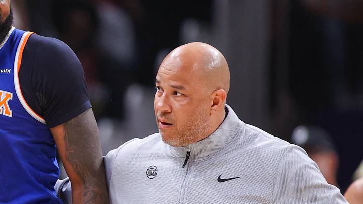 Apr 30, 2026; Atlanta, Georgia, USA; New York Knicks center Mitchell Robinson (23) is restrained by assistant coach Rick Brunson against the Atlanta Hawks in the second quarter during game six of the first round of the 2026 NBA Playoffs at State Farm Arena. Mandatory Credit: Brett Davis-Imagn Images