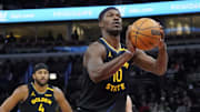 Feb 8, 2025; Chicago, Illinois, USA; Golden State Warriors forward Jimmy Butler (10) shoots a free throw against the Chicago Bulls during the first half at United Center. Mandatory Credit: David Banks-Imagn Images