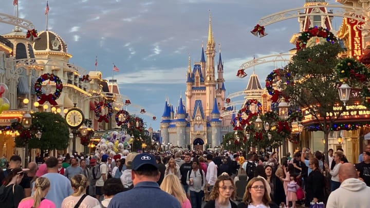 Expect decorations, and people, to line the streets of Walt Disney World's Magic Kingdom over the holidays.