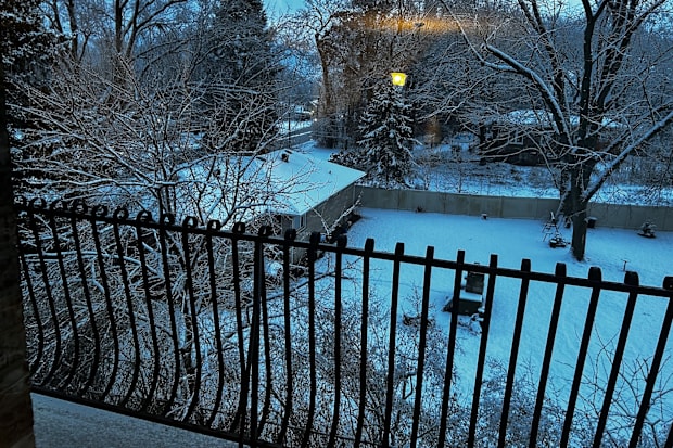Snow falls in Schererville, Ind. on the morning of Indiana's playoff game with Notre Dame. 
