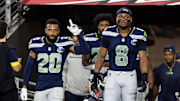 Sep 25, 2025; Glendale, Arizona, USA; Seattle Seahawks safety Julian Love (20) and Coby Bryant (8) against the Arizona Cardinals at State Farm Stadium. 