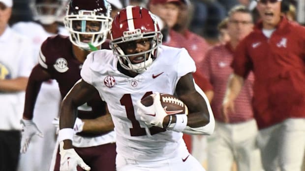 Alabama Crimson Tide wide receiver Malik Benson makes a move after catching a pass against Mississippi State.